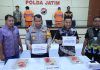 Polda Jatim Amankan Dua Tersangka Pembuat Kontrak Angkutan Ekspedisi Fiktif 11 Miliar Rupiah